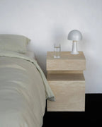 Table d'appoint en travertin Magnifis